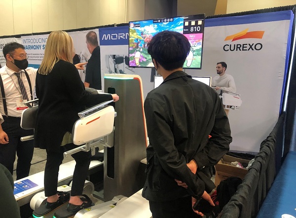 A local U.S. official is using the morning walk of Curexo installed at the AOTA EXPO 2022 site.